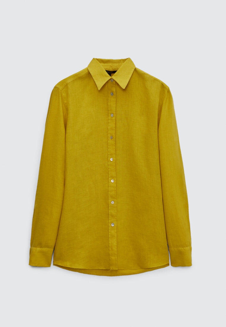 Привет из нулевых Рианна возвращает моду на миниюбки и яркие рубашки