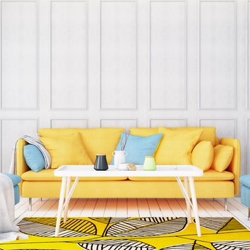 Яркий желтый диван с бирюзовыми подушками