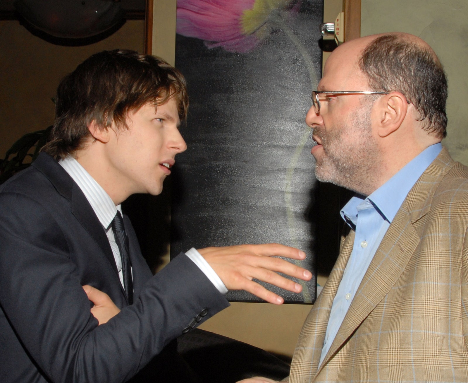 Джейзи Айзенберг и Скотт Руди на мероприятии в честь DVDрелиза фильма «Социальная сеть» в Калифорнии 2011 год.