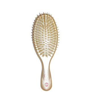 Vess щетка массажная с растительными компонентами для увлажнения и придания блеска волосам.