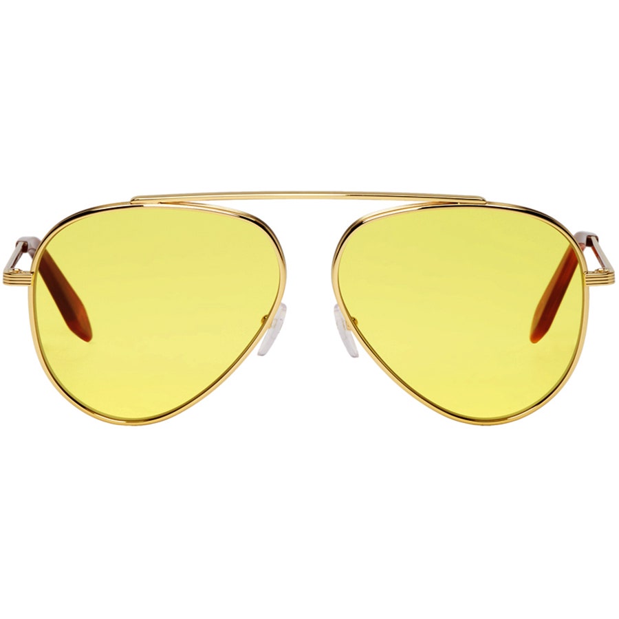 Солнцезащитные очки в металлической оправе 21 560 руб. Victoria Beckham.