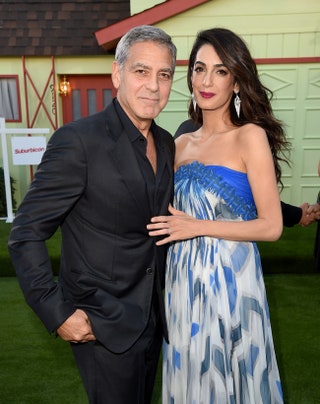 С женой Амаль Клуни.