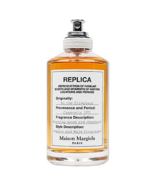 Maison Margiela Replica парфюмированная вода By The Fireplace с нотами горящего дерева и каштана