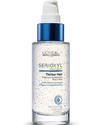 Средство для уплотнения волос Serioxyl L'Oral Professionel.