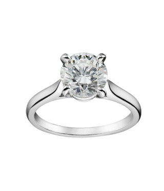 Кольцо из платины с бриллиантом цена по запросу Cartier.