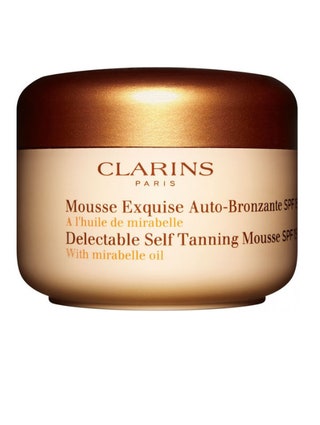 Мусс для искусственного загара лица и тела Mousse Exquise AutoBronzante SPF15 Clarins.