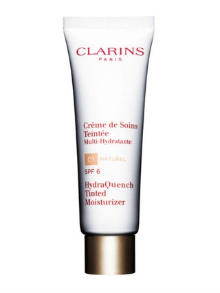 Интенсивно увлажняющий крем с легким тоном Crème de Soins Teinte SPF 6 MultiHydratante Clarins.