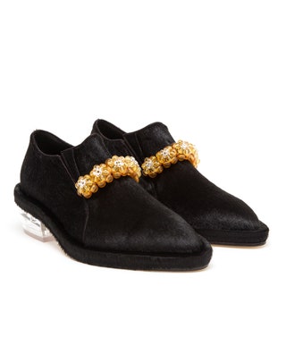 Лоферы из меха пони декорированные пластиковыми цветами 55 000 руб. Simone Rocha