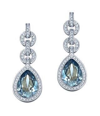 Серьги  из металла с кристаллами 7480 руб. Swarovski.