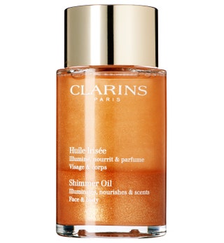 Масло для лица и тела с эффектом мерцания Huile Iriseacutee 2450 руб. Clarins