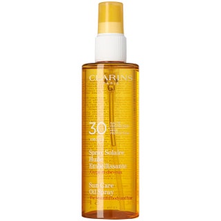 Масло для тела и волос Sun Care SPF 30 1300 руб. Clarins