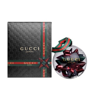 Новогодний шар в подарок при покупке продукции Gucci на сумму от 4500 руб. в сети магазинов laquoЛrsquoЭтуальraquo Gucci