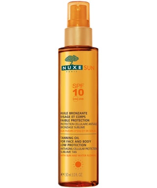 Nuxe sun тонирующее масло для лица и тела  SPF 10 цена по запросу. В новую линию Nuxe sun входит масло для лица и тела c...
