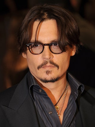 Джонни Депп на премьере фильма quotThe Rum Diaryquot 3 сентября 2011 года. Темные волосы и очки в роговой оправе были...