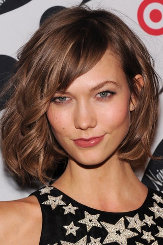 Карли Клосс на запуске коллекции Target  Neiman Marcus 28 ноября 2012 года. Развитые мышцы рук ног и пресса американской...