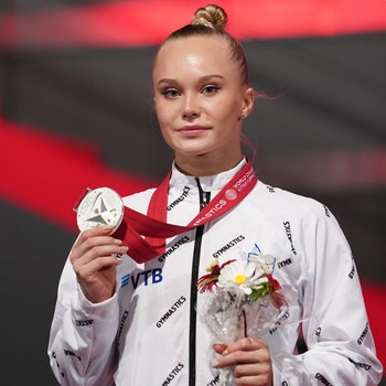 KITAKYUSHU JAPAN  OCTOBER 24 Silver medalist Angelina Melnikova of RGF poses with her medal at a victory ceremony for...