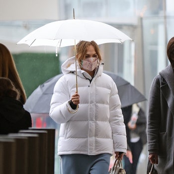 Century City CA   EXCLUSIVE   Jennifer Lopez braves the rain as she does last minute Christmas shopping at the Westfield...