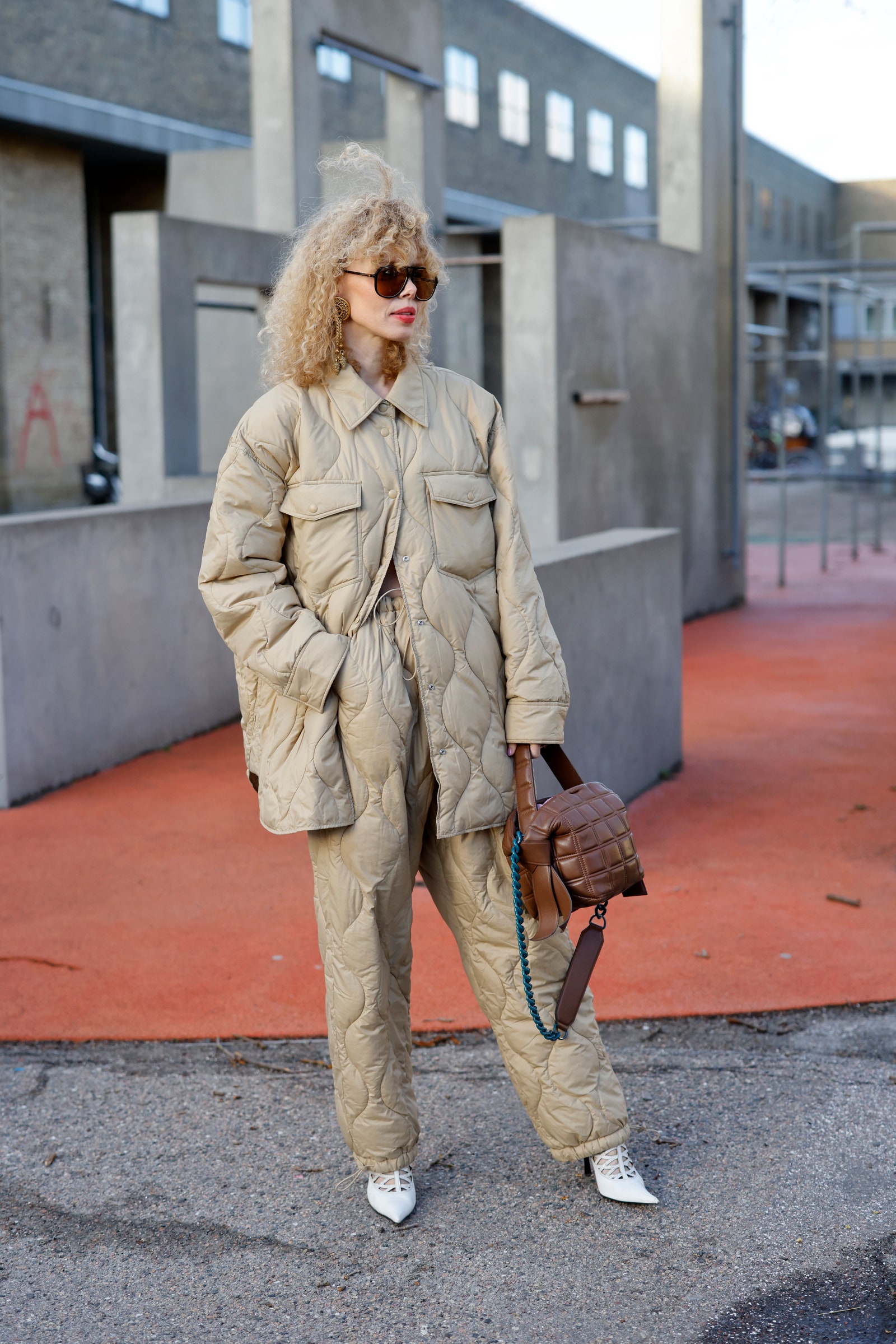 COPENHAGEN DENMARK  FEBRUARY 02 Artist Maya Vik wearing a beige jacket by Arket beige pants by Arket white vintage shoes...